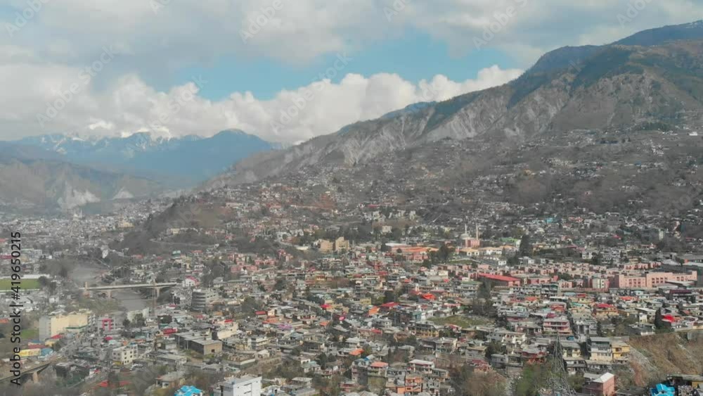Aerial View Of Muzaffarabad City Of Azad Kashmir In Pakistan. Slow Pedestal Up Aerial View Of Muzaffarabad City Of Azad Kashmir In Pakistan. Slow Pedestal Up