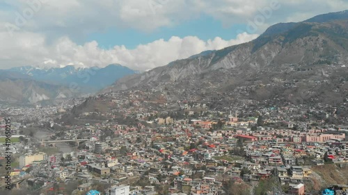 Aerial View Of Muzaffarabad City Of Azad Kashmir In Pakistan. Slow Pedestal Up photo