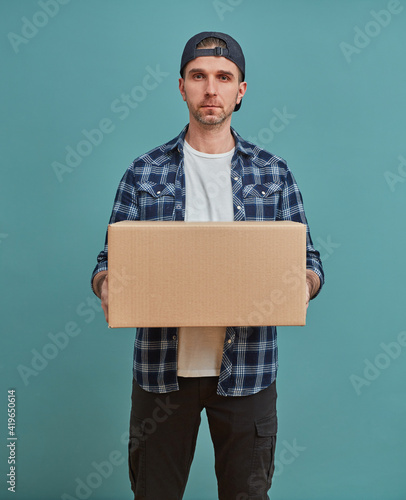 Man holding a cardboard box
