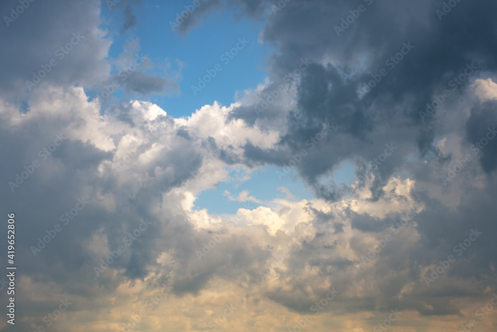 Beautiful stormy cumulus clouds in the sky, background. Beautiful stormy cumulus clouds in the sky, background.