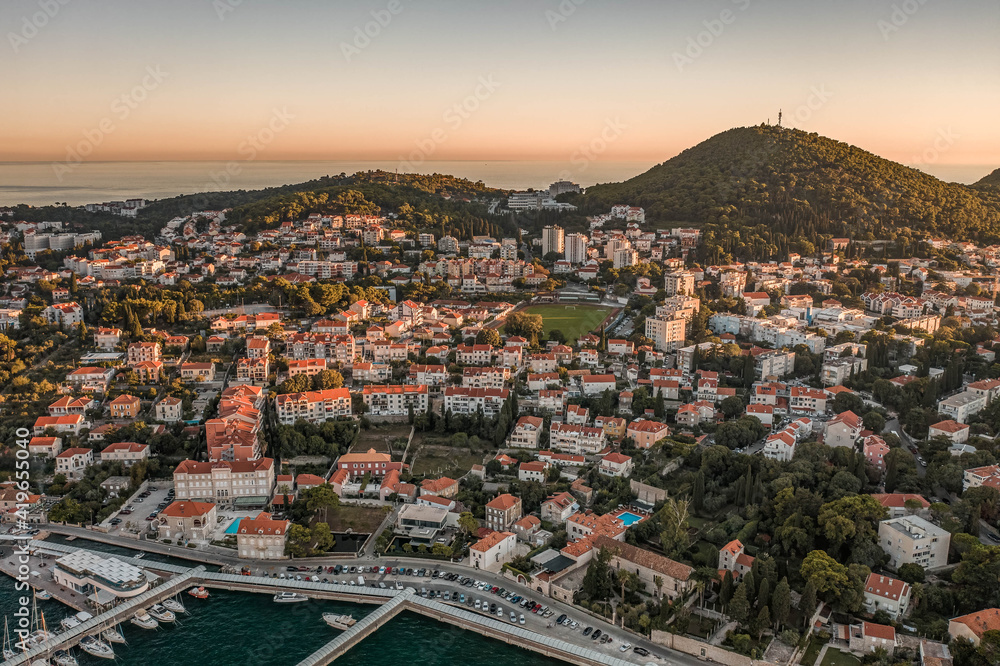 Aerial drone shot of Babin Kuk Hill in Dubrovnik in Croatia summer sunset