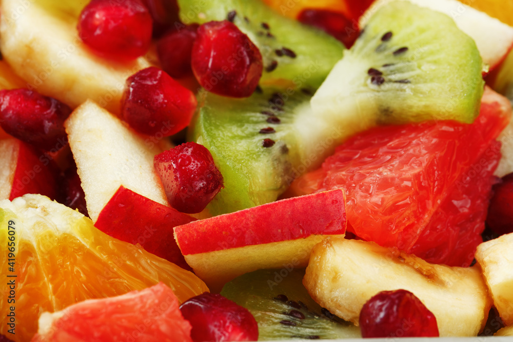 Pieces of raznfh fruit close-up in full screen, Fruit salad. Pieces of raznfh fruit close-up in full screen, Fruit salad.