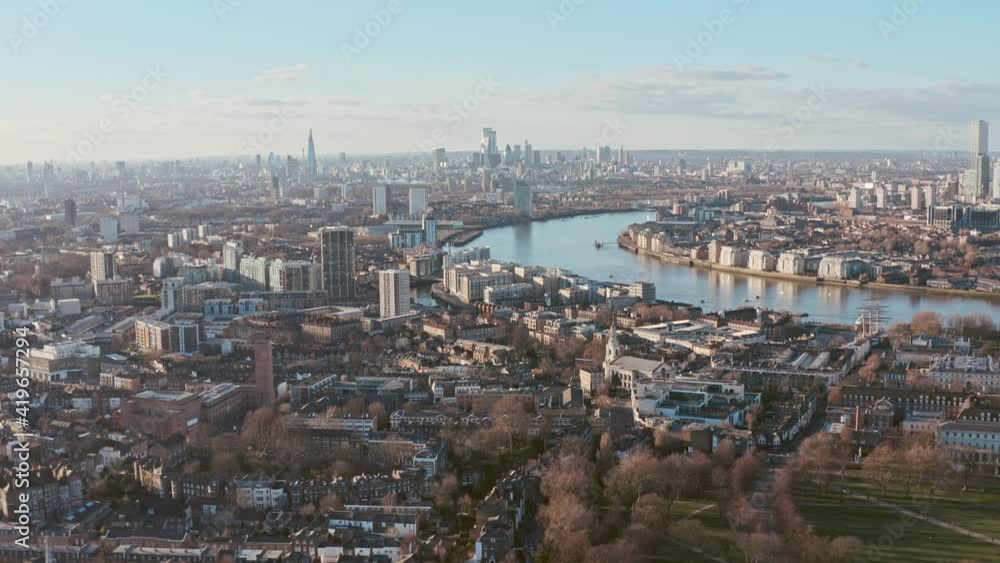 Drone shot towards central London skyline from Greenwich at sunset Drone shot towards central London skyline from Greenwich at sunset