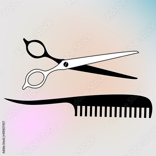 Black and white image of scissors and comb
