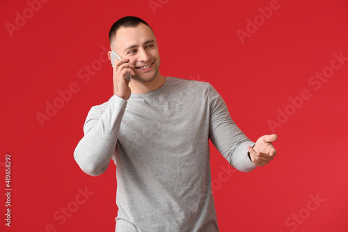 Handsome young man talking ...