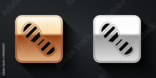 Gold and silver Human footprints shoes icon isolated on black background. Shoes sole. Long shadow style. Vector.