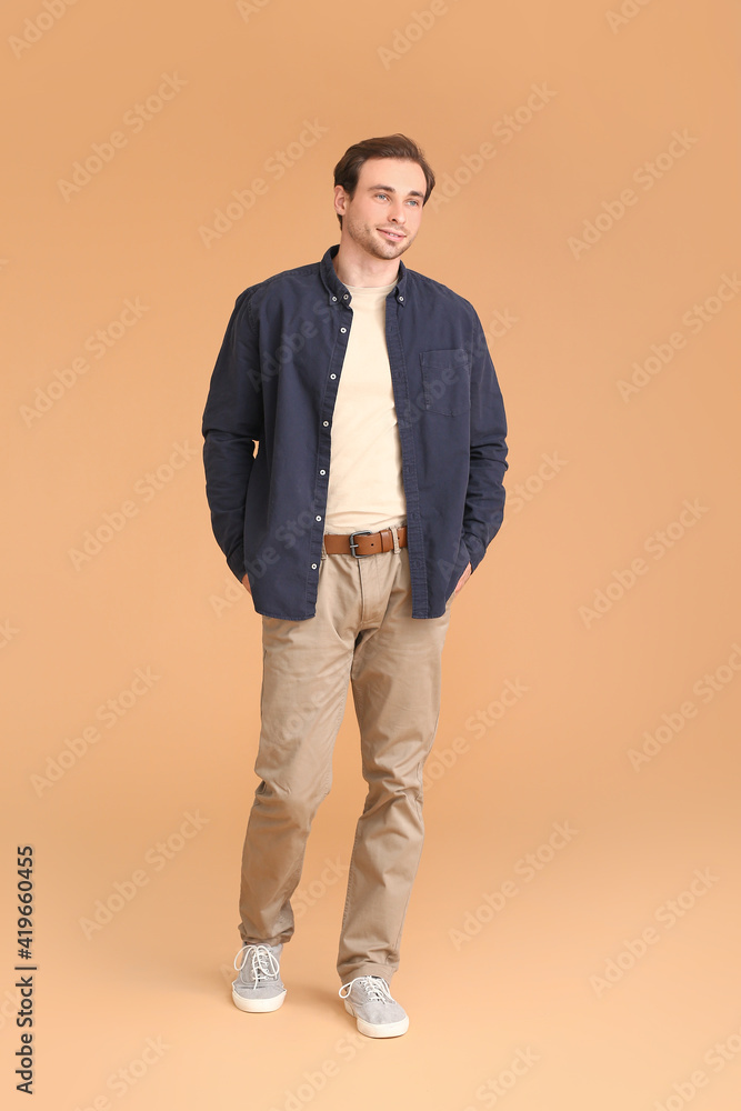 Handsome young man on color background Handsome young man on color background