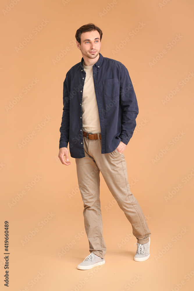 Handsome young man on color background Handsome young man on color background
