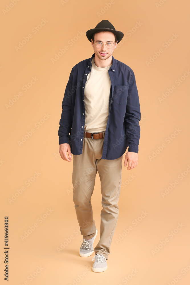 Handsome young man on color background Handsome young man on color background