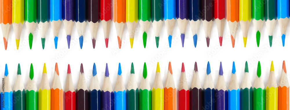 Fototapeta premium pencils isolated on white background with copy space. School and creative painting concept with colored pencils. Back to school banner. packaging template for colored pencils, notebooks and holder