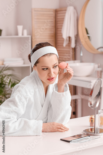 Beautiful young woman with ...