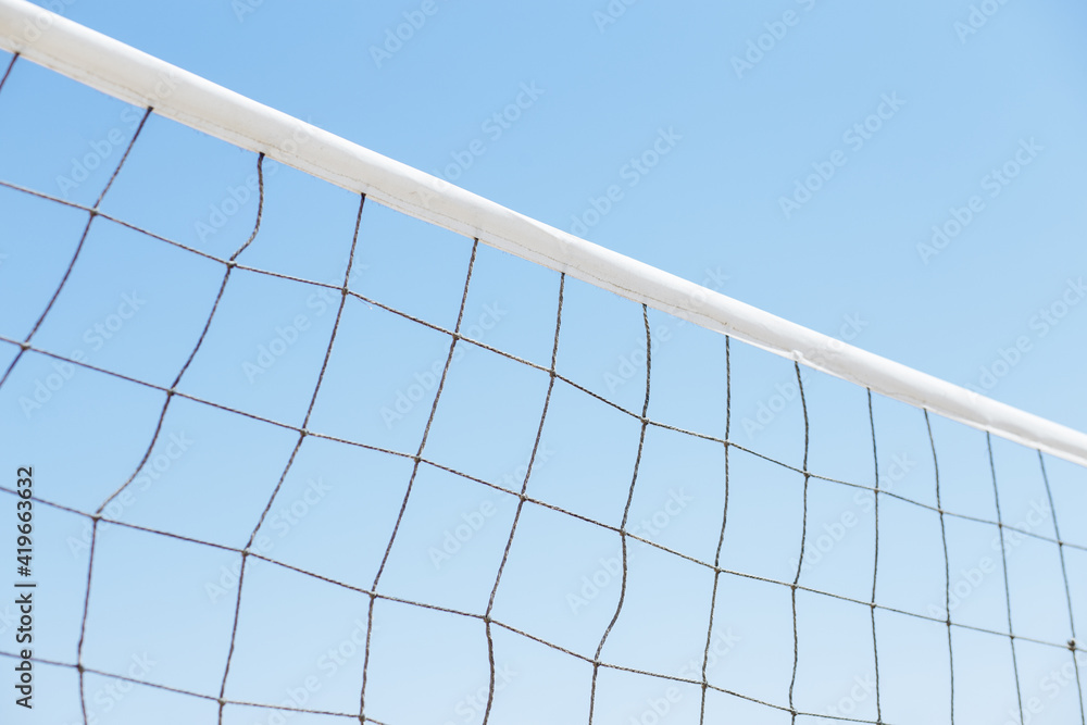 volleyball or tennis net on a background of blue sky volleyball or tennis net on a background of blue sky