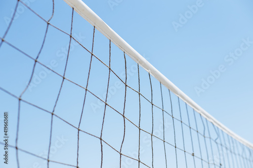volleyball or tennis net on a background of blue sky