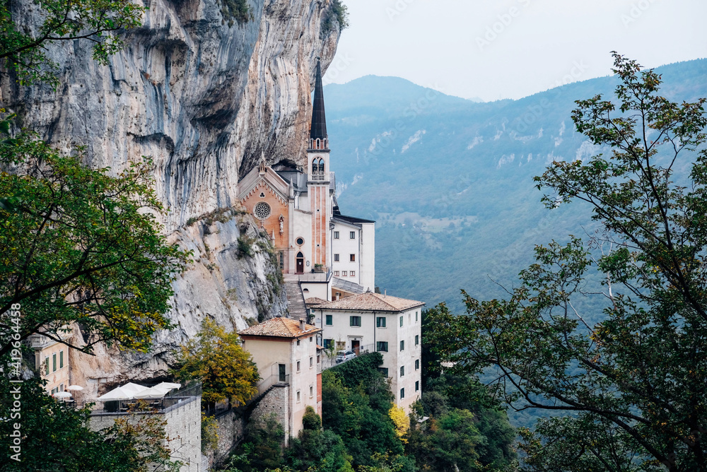 Madonna della Corona sanctuary in Ferrara di Monte Baldo. Tourist attraction and famous place of pilgrimage in Italy, Province of Verona, Veneto region. Church built in the mountain rock. Madonna della Corona sanctuary in Ferrara di Monte Baldo. Tourist attraction and famous place of pilgrimage in Italy, Province of Verona, Veneto region. Church built in the mountain rock.