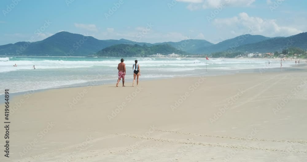 Brazilian beach. Sandy wide beach in the town of Campeche during sunny day, Brazil Brazilian beach. Sandy wide beach in the town of Campeche during sunny day, Brazil