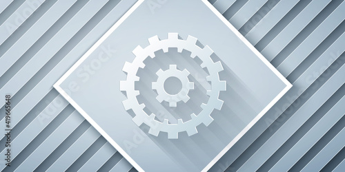 Paper cut Bicycle cassette mountain bike icon isolated on grey background. Rear Bicycle Sprocket. Chainring crankset with chain. Paper art style. Vector.