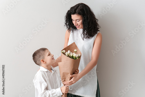 Little boy greeting his mom...