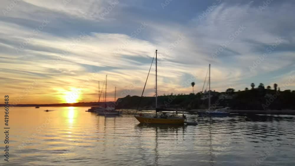Aerial view of sailing boats during sunset in Alvor Bay, Portugal 2 Aerial view of sailing boats during sunset in Alvor Bay, Portugal 2
