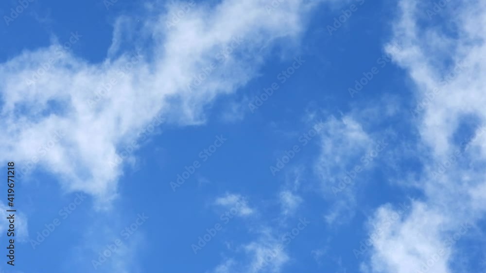 Timelapse video of clouds moving fast in deep blue sky Timelapse video of clouds moving fast in deep blue sky