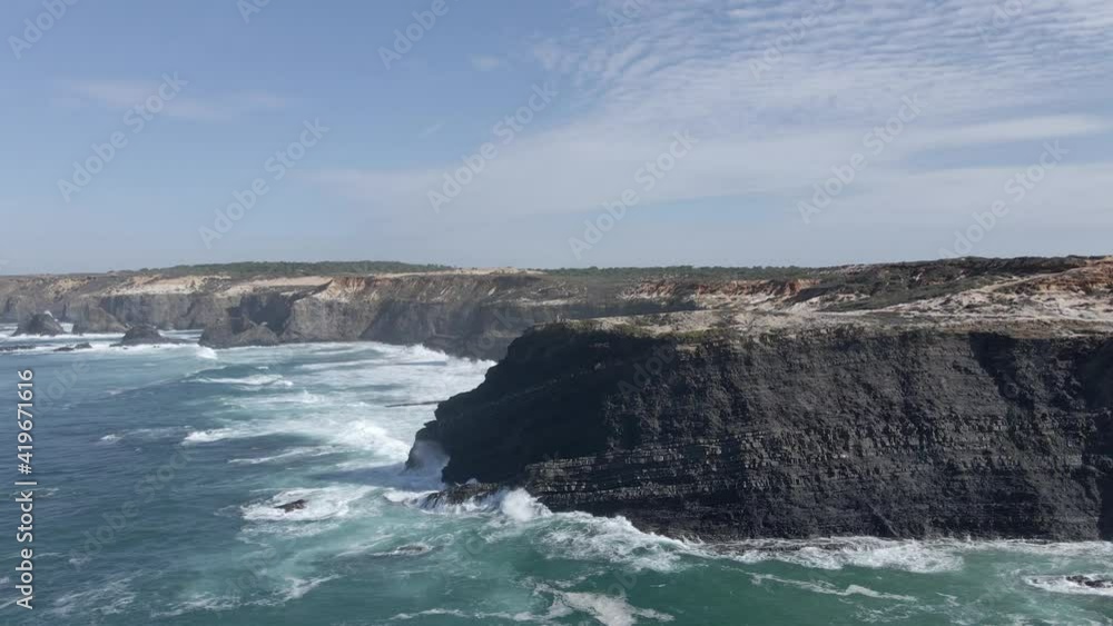 Aerial view of rugged cliffs in Algarve, Portugal 2 Aerial view of rugged cliffs in Algarve, Portugal 2