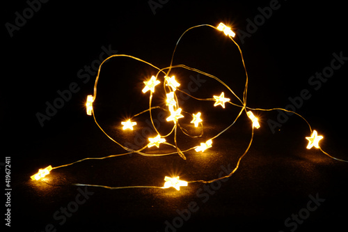 Star shape electrical LEDs lighting in the dark