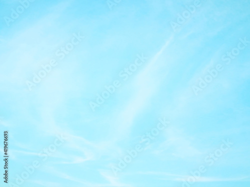 Blue pastel colour sky with white clouds background. 