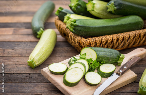 Photography Fresh organic zucchini on the wooden table