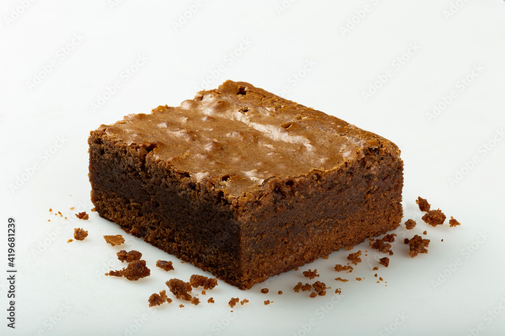 Delicious pieces of fresh brownie on white background. Chocolate pie. Delicious pieces of fresh brownie on white background. Chocolate pie.
