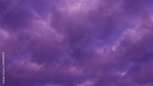 Purple clouds in the sky. Majestic Colorful color of Time lapse Amazing sky Majestic sunset or sunrise landscape  photo