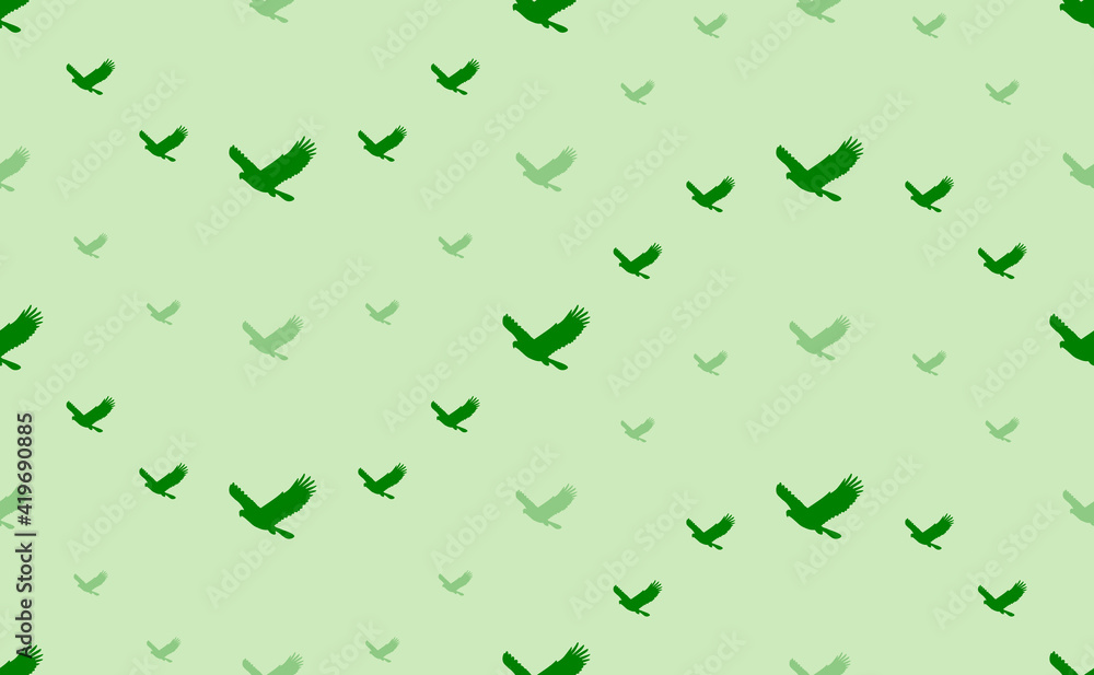 Fototapeta premium Seamless pattern of large and small green eagle symbols. The elements are arranged in a wavy. Vector illustration on light green background