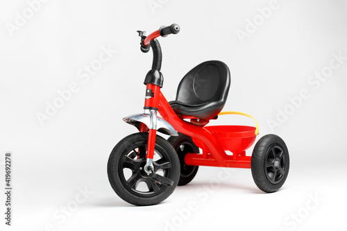 kids tricycle red bike on white background photo