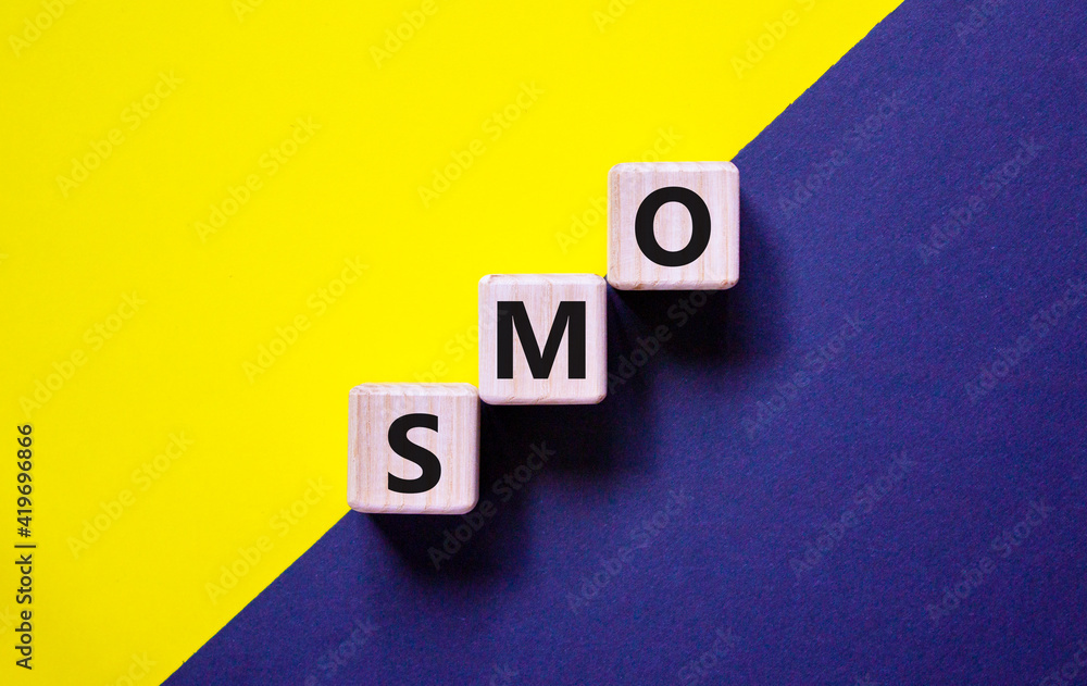 SMO, social media optimization symbol. Wooden cubes with word 'SMO ...