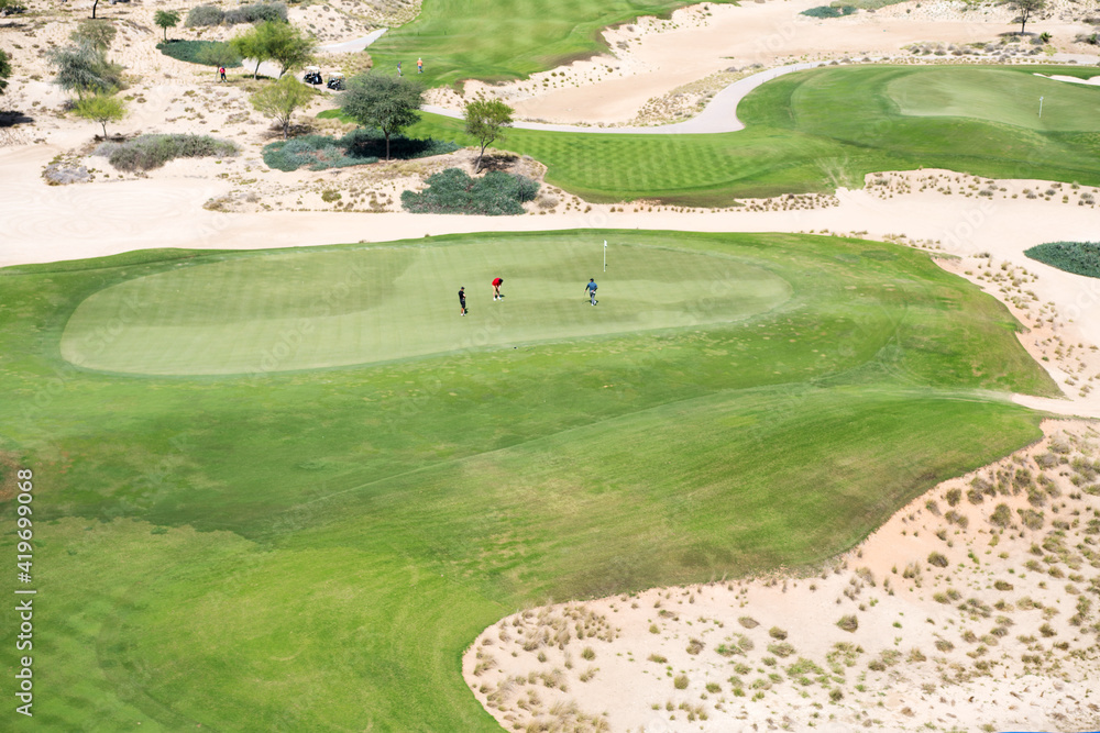 View from above people playing golf View from above people playing golf
