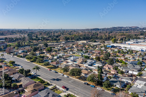 Drone Aerial View Suburban Coastal California Neighborhood. Single Family Homes Near A Park and Ocean