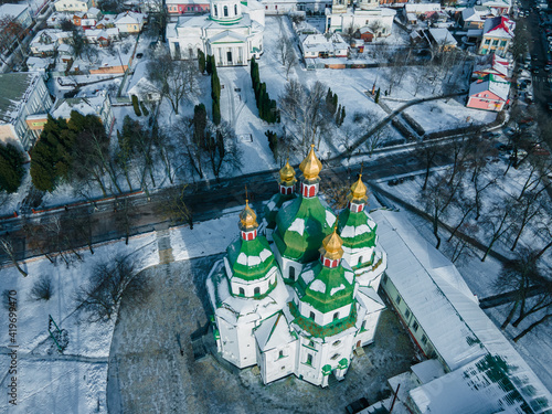 Aerial view from a drone of the Mykolayivsʹkyy Sobor in the Ukrainian Baroque style in the city of Nizhyn, Chernihiv region photo