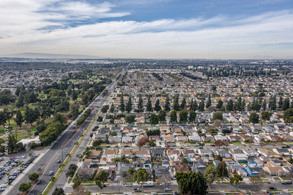 Fototapeta premium Drone Aerial View Suburban Coastal California Neighborhood. Single Family Homes Near A Park and Ocean