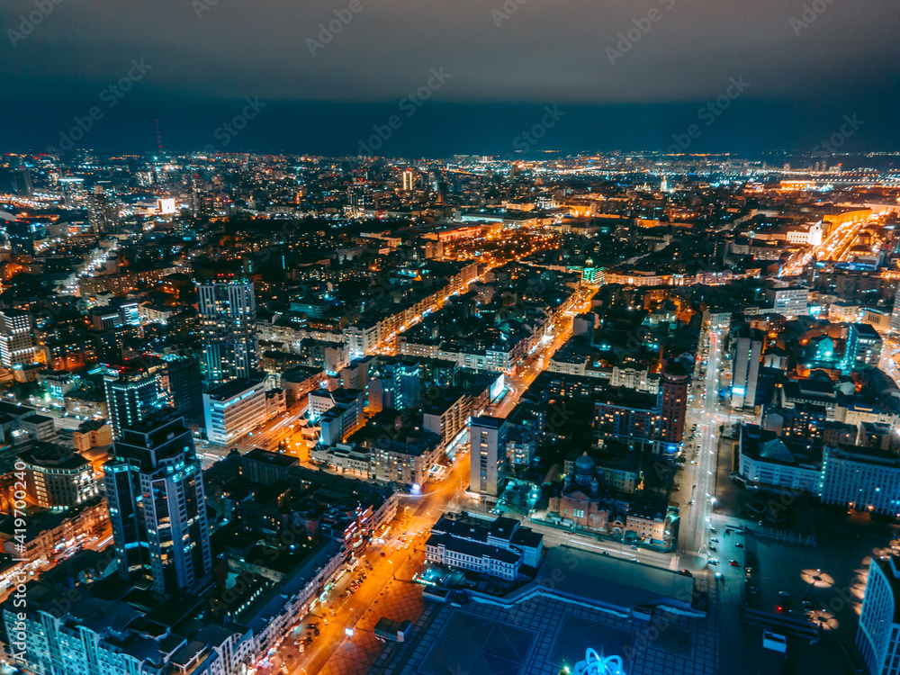 Fototapeta premium Aerial view from a drone of the business center of the capital of the metropolis Kyiv at night
