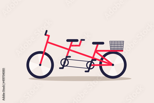 Red tandem bicycle with basket.