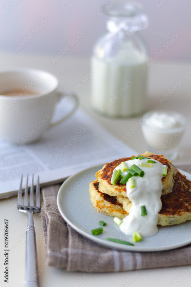 Breakfast with coffee and milk and cheese pancakes. Healthy food