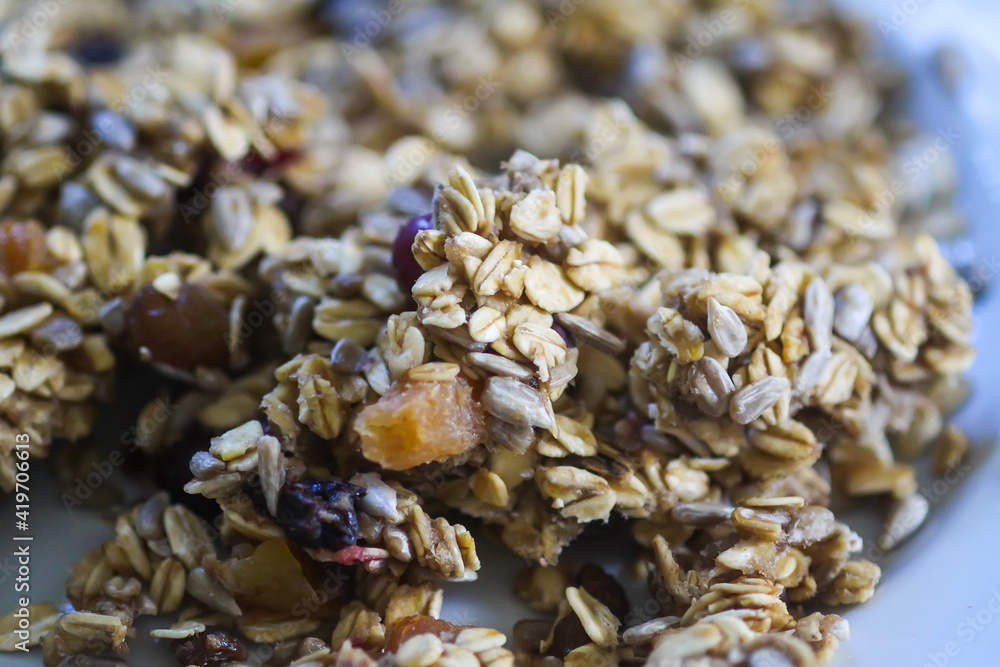 Organic granola cereal with oats and dried fruits. Organic granola cereal with oats and dried fruits.