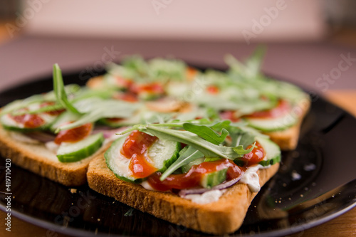 delicious rocket salad sandwiches on a plate