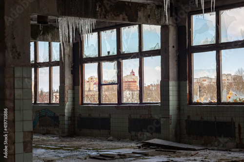 an abandoned production facility with ice build-up inside