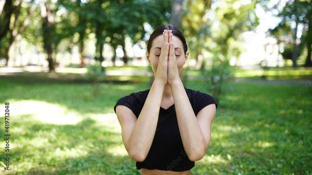 Athletic young woman doing yoga in the Park in the morning. Athletic young woman doing yoga in the Park in the morning.