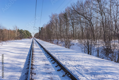 Railway track at sunny winter day time. © serjiob74