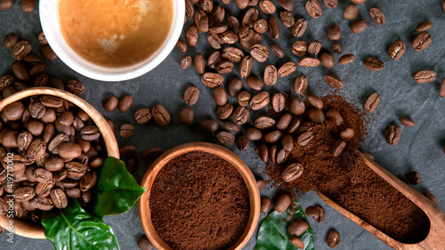 Roasted Coffee Beans, still-life on Black Stone Background, close-up.