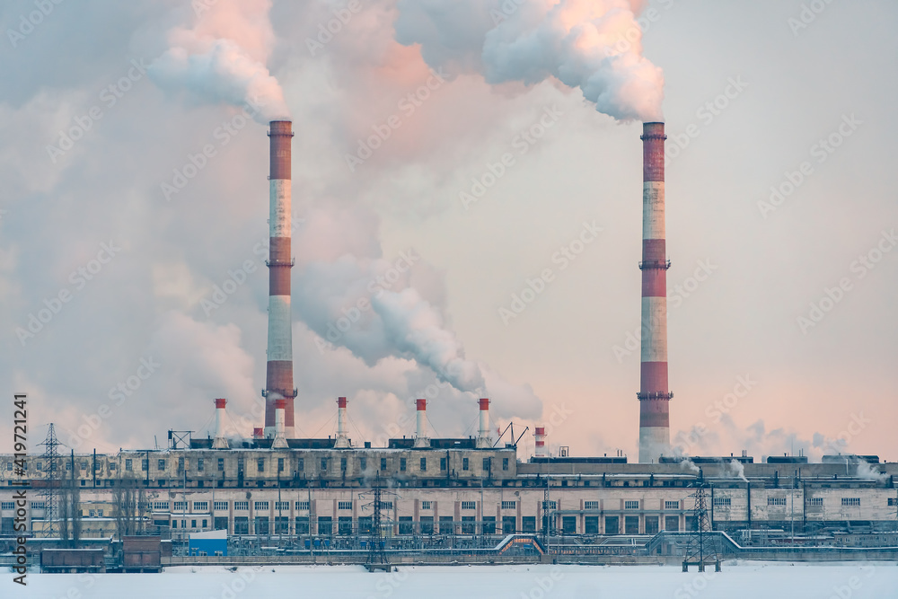 Environmental problem of pollution of environment and air in cities. Smoking industrial zone factory chimneys