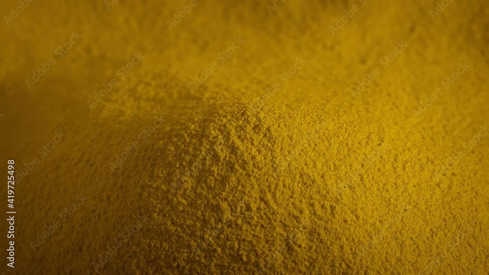 Yellow Powder Pile Rotating Slowly