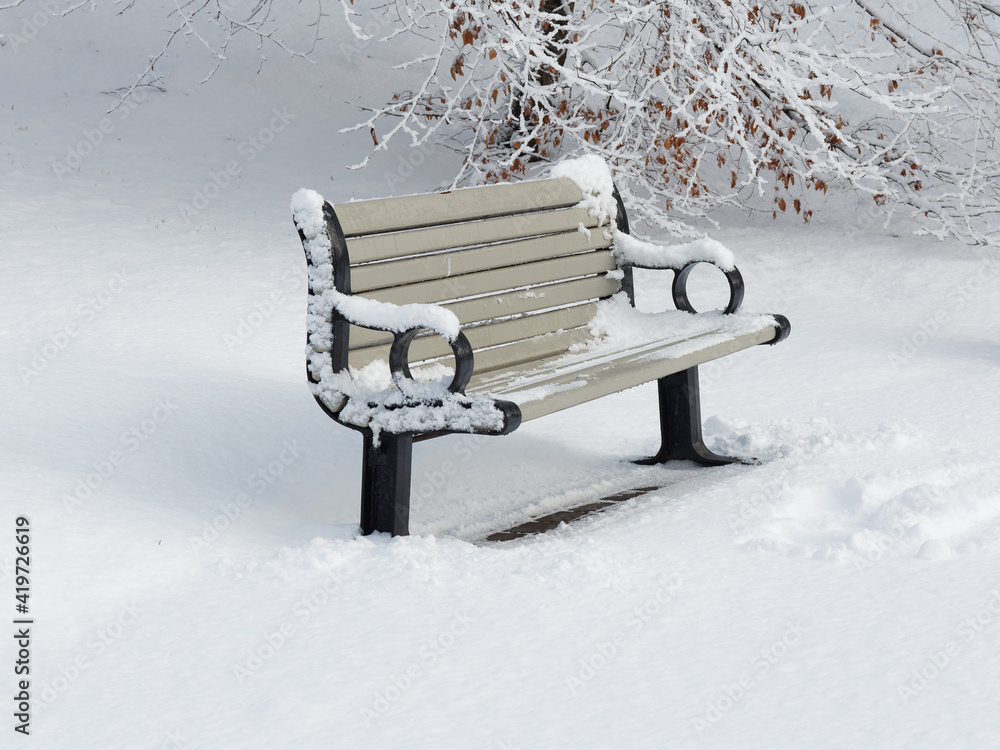 After a snowfall. Bench in the snow.