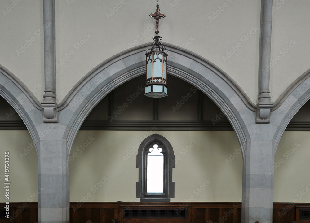 archway and light in interior of the church