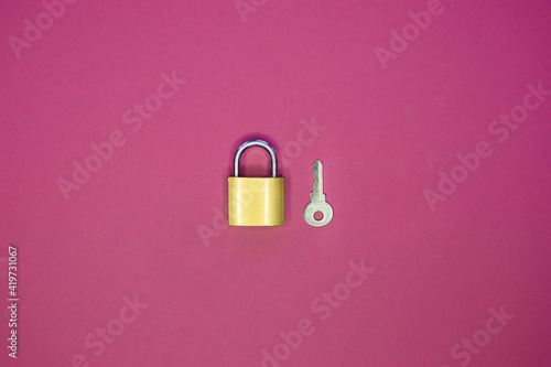 lock and key on a purple background